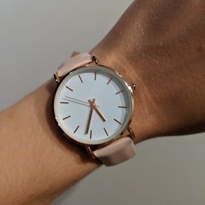 Rose gold watch with blush leather strap